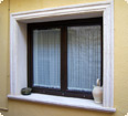 Double sash window with net curtains