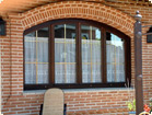 Four panel window with grilles on the glass
